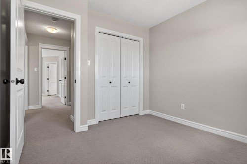 closet-opposite view - 332 Nelson Drive, Spruce Grove, AB - Indoor Photo Showing Other Room