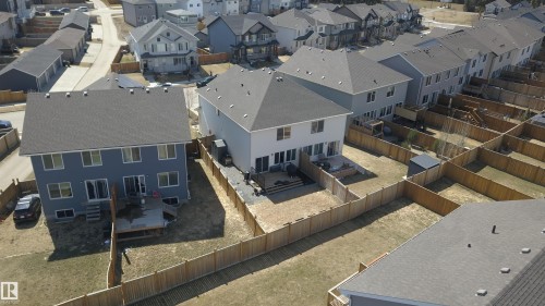 Two-story residence with a composite shingle roof and light blue siding - 4314 Cooke Lane, Edmonton, AB - 