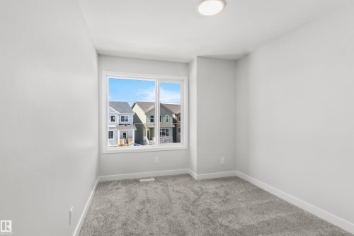 287 Paterson Link Link, Edmonton, AB - Indoor Photo Showing Other Room