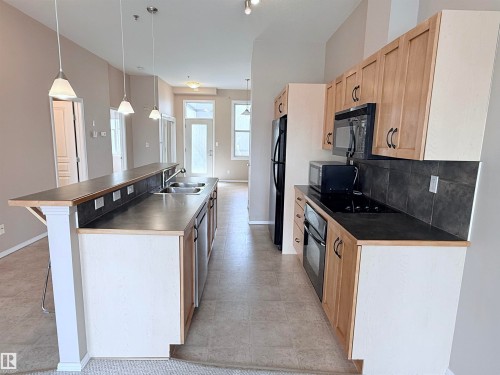 513 10147 112 Street, Edmonton, AB - Indoor Photo Showing Kitchen With Double Sink