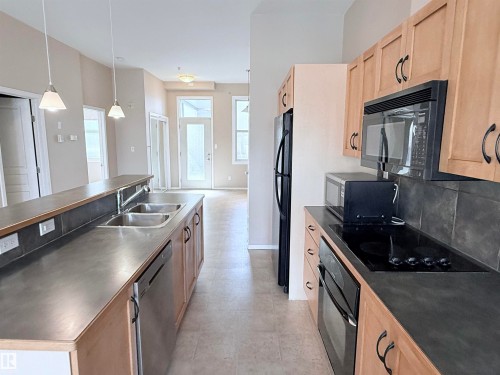 513 10147 112 Street, Edmonton, AB - Indoor Photo Showing Kitchen With Double Sink
