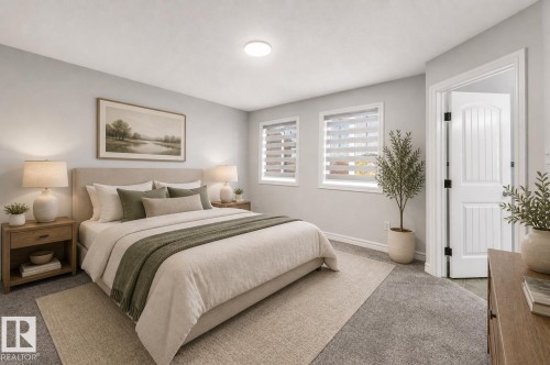 Spacious room featuring light gray wall tones, two windows with horizontal blinds, and neutral-toned carpeting - 1921 119A Street, Edmonton, AB - Indoor Photo Showing Bedroom