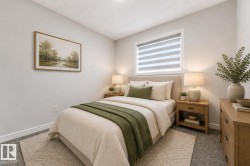 Bedroom featuring neutral wall paint, grey carpet flooring, and a window with horizontal blinds - 