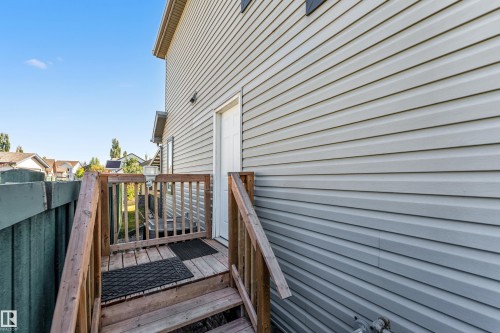 Exterior deck with wood railing and steps - 1921 119A Street, Edmonton, AB - Outdoor With Exterior