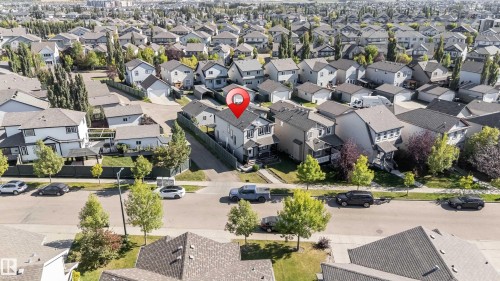 Residential neighborhood featuring numerous detached homes with varying architectural styles - 1921 119A Street, Edmonton, AB - Outdoor With View