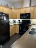 226 2503 Hanna Crescent, Edmonton, AB  - Indoor Photo Showing Kitchen With Double Sink 