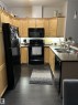 226 2503 Hanna Crescent, Edmonton, AB  - Indoor Photo Showing Kitchen With Double Sink 