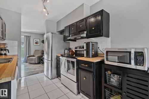 8 1020 41 Street, Edmonton, AB - Indoor Photo Showing Kitchen With Double Sink