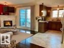 **VIRTUALLY STAGED** - 609 10142 111 Street, Edmonton, AB  - Indoor Photo Showing Living Room With Fireplace 