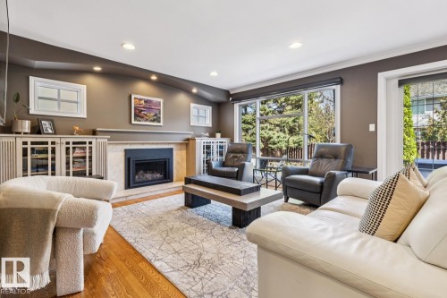 701 Romaniuk Road, Edmonton, AB - Indoor Photo Showing Living Room With Fireplace