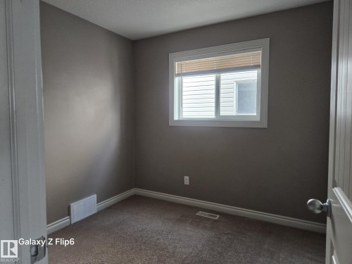 Edmonton, AB - Indoor Photo Showing Other Room