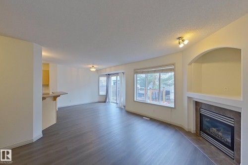 57 155 Crocus Crescent, Sherwood Park, AB - Indoor Photo Showing Living Room With Fireplace