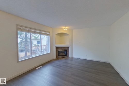 57 155 Crocus Crescent, Sherwood Park, AB - Indoor Photo Showing Living Room With Fireplace