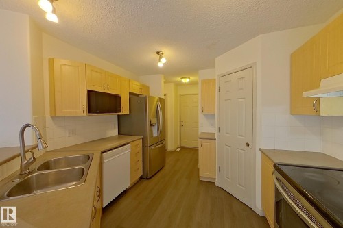 57 155 Crocus Crescent, Sherwood Park, AB - Indoor Photo Showing Kitchen With Double Sink