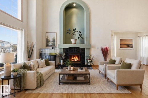 (virtually staged) - 10331 156 Avenue, Edmonton, AB - Indoor Photo Showing Living Room With Fireplace