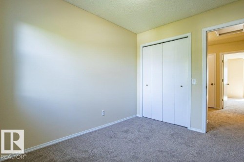 Bedroom 2 - 41 8304 11 Avenue, Edmonton, AB - Indoor Photo Showing Other Room