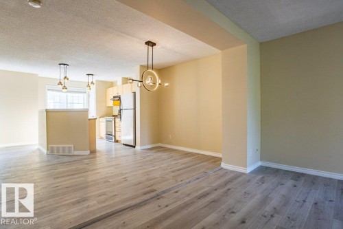 Dining room and kitchen - 41 8304 11 Avenue, Edmonton, AB - Indoor Photo Showing Other Room
