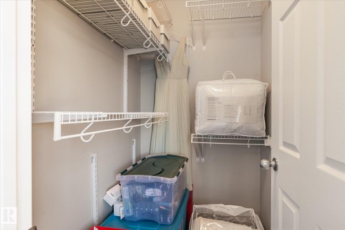 Customizable wire shelving and hanging rods offer versatile storage solutions - 7114 22 Avenue, Edmonton, AB - Indoor