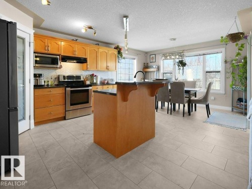 1476 Mcmillian Way, Edmonton, AB - Indoor Photo Showing Kitchen With Stainless Steel Kitchen