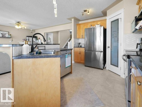 1476 Mcmillian Way, Edmonton, AB - Indoor Photo Showing Kitchen With Stainless Steel Kitchen With Double Sink