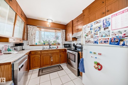 12106 48 Street, Edmonton, AB - Indoor Photo Showing Kitchen With Double Sink