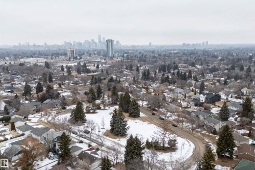 Aerial view of the surrounding neighborhood with a distant cityscape visible - 7720 85 Avenue, Edmonton, AB - Outdoor With View