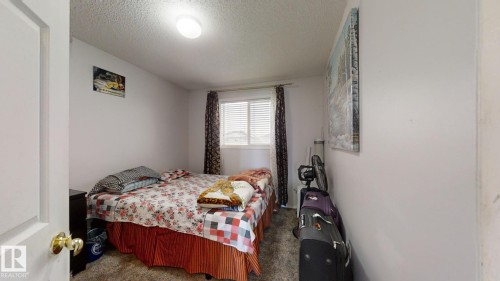 3023 31 Avenue, Edmonton, AB - Indoor Photo Showing Bedroom