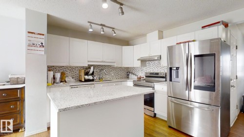 3023 31 Avenue, Edmonton, AB - Indoor Photo Showing Kitchen With Stainless Steel Kitchen