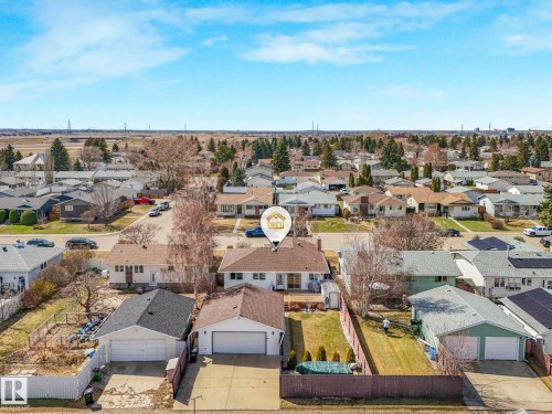 Aerial perspective showcasing a residential neighborhood - 1027 77 Street, Edmonton, AB - Outdoor With View