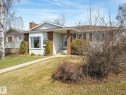 Single-story home featuring white siding and a prominent bay window - 1027 77 Street, Edmonton, AB  - Outdoor 
