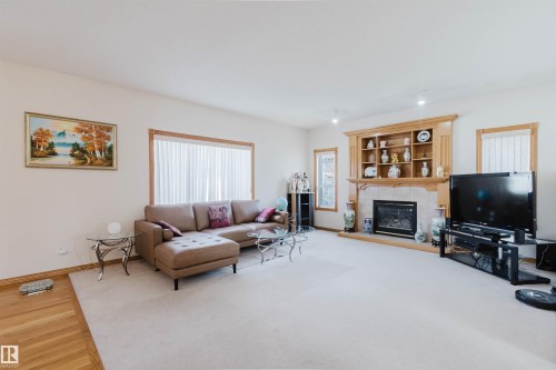 8608 160A Avenue, Edmonton, AB - Indoor Photo Showing Living Room With Fireplace