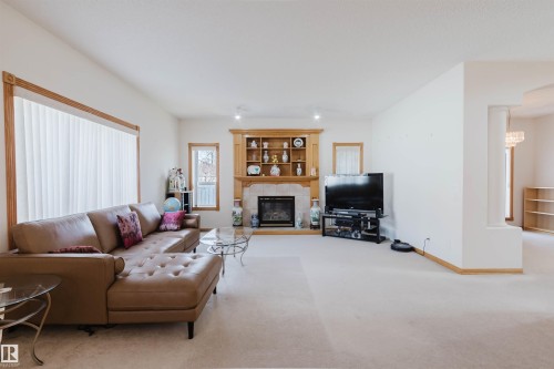 8608 160A Avenue, Edmonton, AB - Indoor Photo Showing Living Room With Fireplace