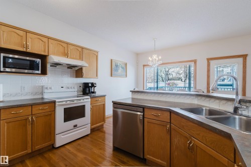 8608 160A Avenue, Edmonton, AB - Indoor Photo Showing Kitchen With Double Sink