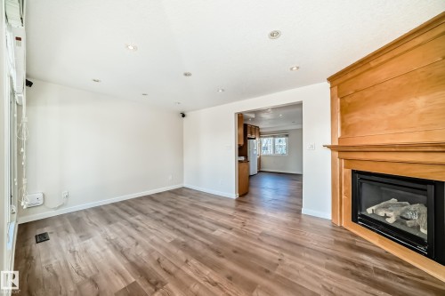 3139 109 Street, Edmonton, AB - Indoor Photo Showing Living Room With Fireplace