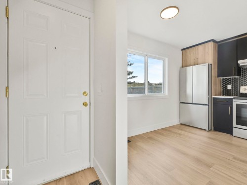 10 13833 30 Street, Edmonton, AB - Indoor Photo Showing Kitchen With Stainless Steel Kitchen