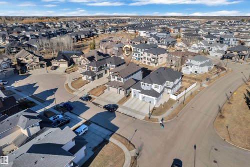 Residential neighborhood featuring a curvilinear street layout and a mix of single-family homes and multi-story residences - 4403 Triomphe Gate, Beaumont, AB - Outdoor With View
