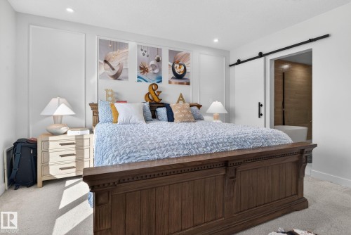 Spacious room featuring light-colored carpeting and recessed ceiling lighting - 3605 42 Avenue, Beaumont, AB - Indoor Photo Showing Bedroom