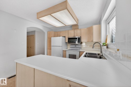 156 Oeming Road, Edmonton, AB - Indoor Photo Showing Kitchen With Double Sink