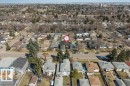 Aerial perspective showcasing a residential neighborhood with varied housing styles - 10323 79 Street, Edmonton, AB  - Outdoor With View 