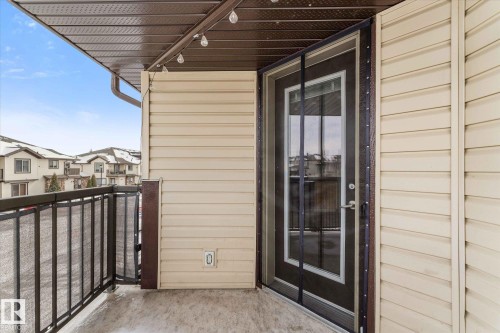 Multi-story townhouse exterior featuring horizontal siding and stone accents - 86 604 62 Street, Edmonton, AB - Outdoor