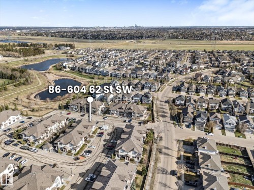 Residential community featuring a mix of detached homes and multi-unit buildings - 86 604 62 Street, Edmonton, AB - Outdoor With View