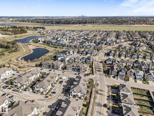 Townhome community featuring multi-story residences with gabled roofs - 86 604 62 Street, Edmonton, AB - Outdoor With View