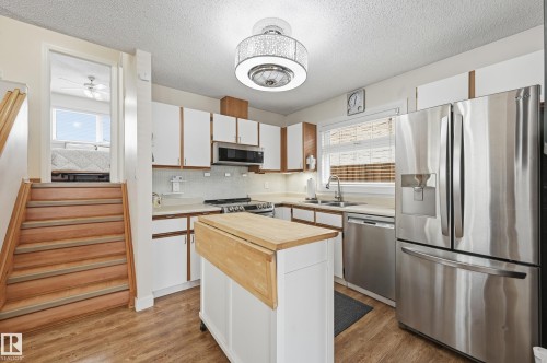 8305 157 Avenue, Edmonton, AB - Indoor Photo Showing Kitchen With Stainless Steel Kitchen With Double Sink