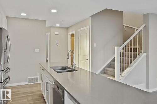 2374 Wonnacott Crescent, Edmonton, AB - Indoor Photo Showing Kitchen With Double Sink