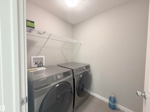 2374 Wonnacott Crescent, Edmonton, AB - Indoor Photo Showing Laundry Room