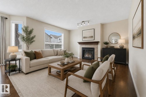 Living room with AI staging for reference of its potential once furnished. - 20813 96A Avenue, Edmonton, AB - Indoor Photo Showing Living Room With Fireplace