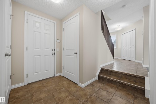 Main level hallway from the garage. - 20813 96A Avenue, Edmonton, AB - Indoor Photo Showing Other Room