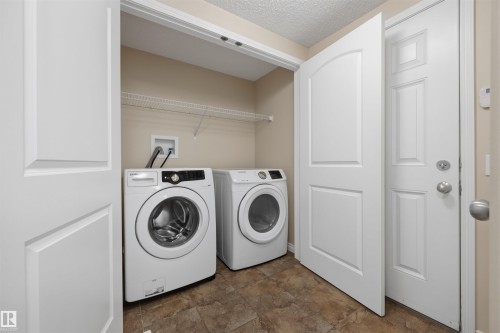 Main level laundry room. - 20813 96A Avenue, Edmonton, AB - Indoor Photo Showing Laundry Room