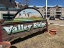 Property entrance sign featuring a painted nature scene and "Valley Ridge" text - 410 9926 100 Avenue, Fort Saskatchewan, AB  - Outdoor 