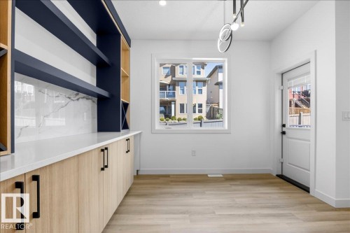 1150 Gyrfalcon Crescent, Edmonton, AB - Indoor Photo Showing Other Room